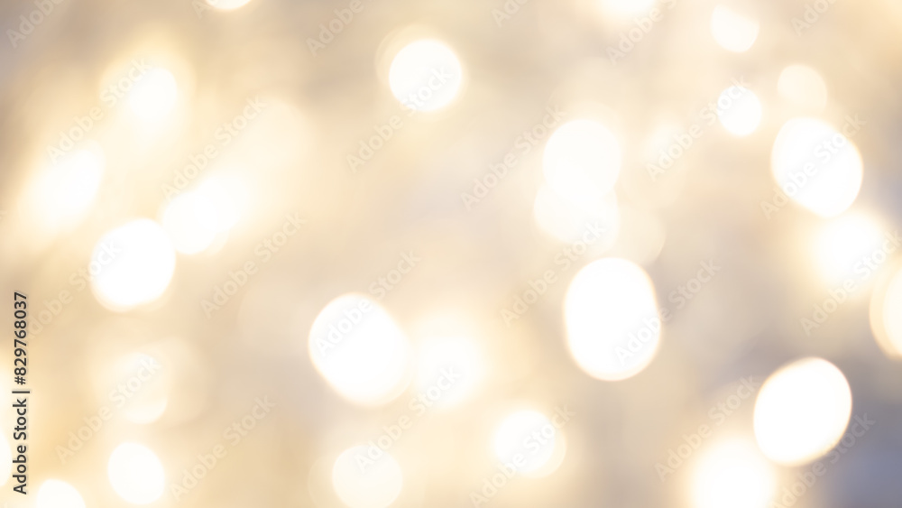 Golden bokeh background with soft, shimmering lights creating a warm ambiance. Golden bokeh background with soft, shimmering lights creating a warm ambiance.
