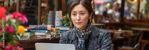 Inspiring remote work woman in casual attire at cozy coffee shop with books and plants