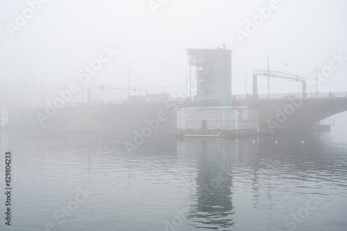 Wall Mural Copenhagen habour covered in fog