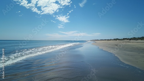 The vast expanse of the beach meets the endless horizon  where the sky and sea blend seamlessly. The open space and natural beauty offer a sense of freedom and serenity.