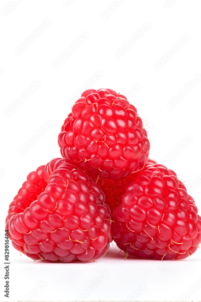 Red raspberries isolated on a white Red raspberries isolated on a white