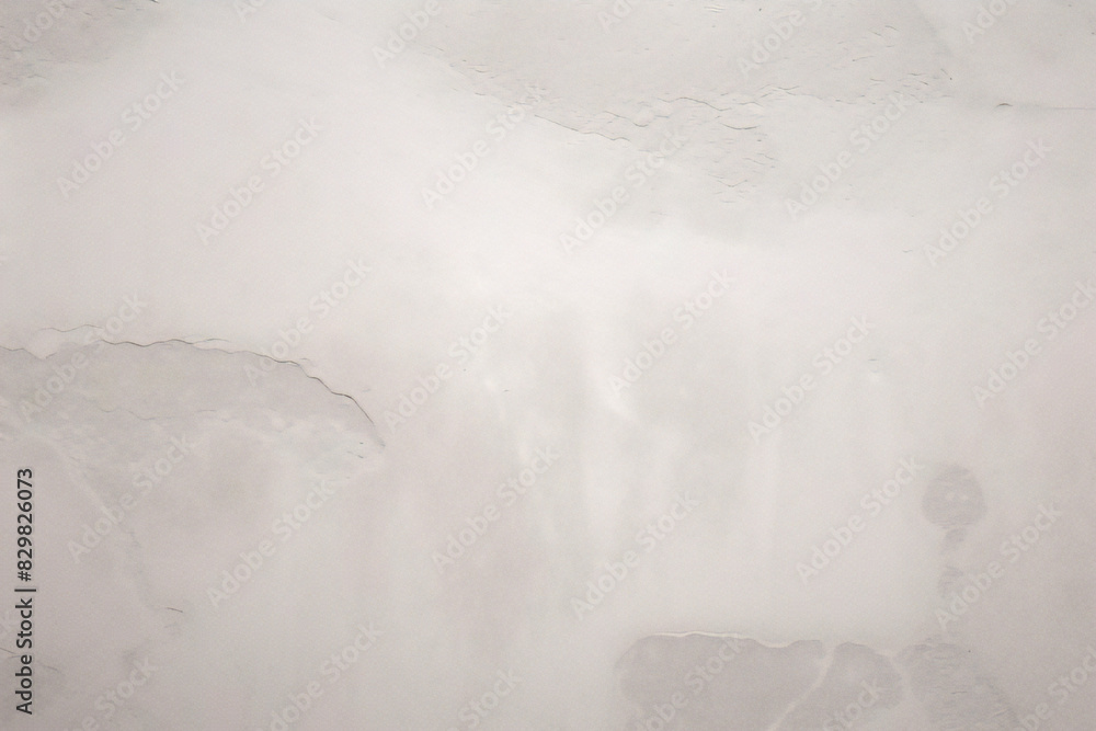 Obraz premium 白灰色のグランジ背景、粗い質感の水彩背景。