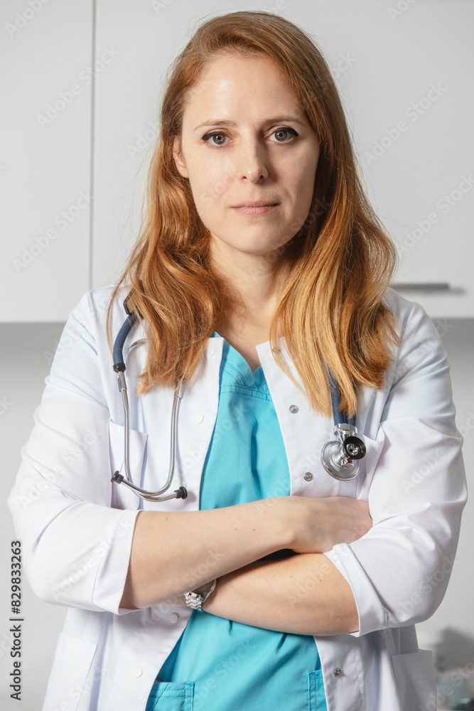 Young female medicine doctor working at her office. Healthcare and medical concept.Doctor in white coat stay at her medical cabinet in the clinic and waiting for a pacient. Young female medicine doctor working at her office. Healthcare and medical concept.Doctor in white coat stay at her medical cabinet in the clinic and waiting for a pacient.