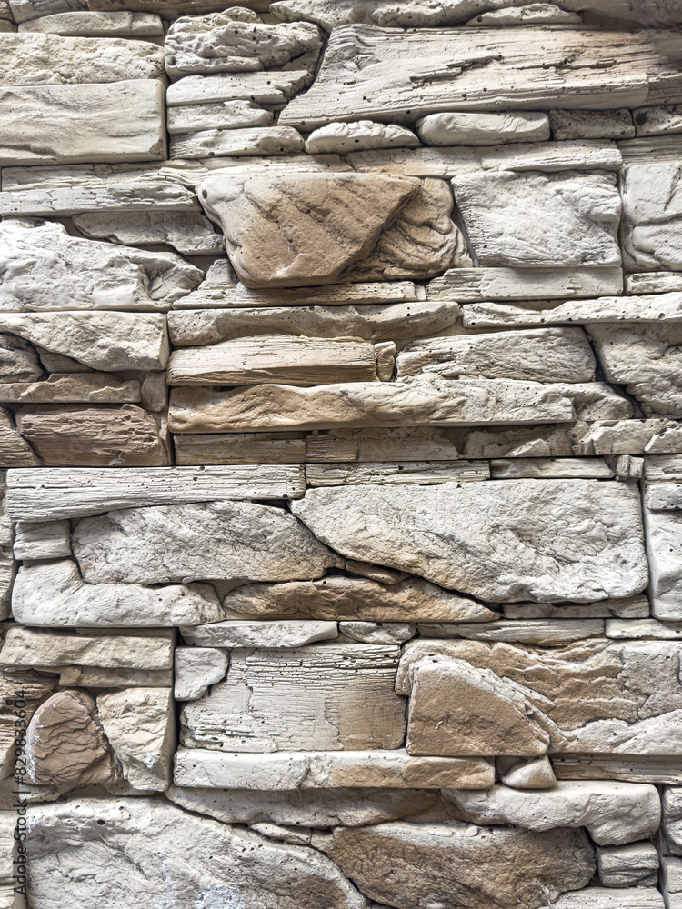 Fototapeta premium pattern of decorative stone wall surface natural color