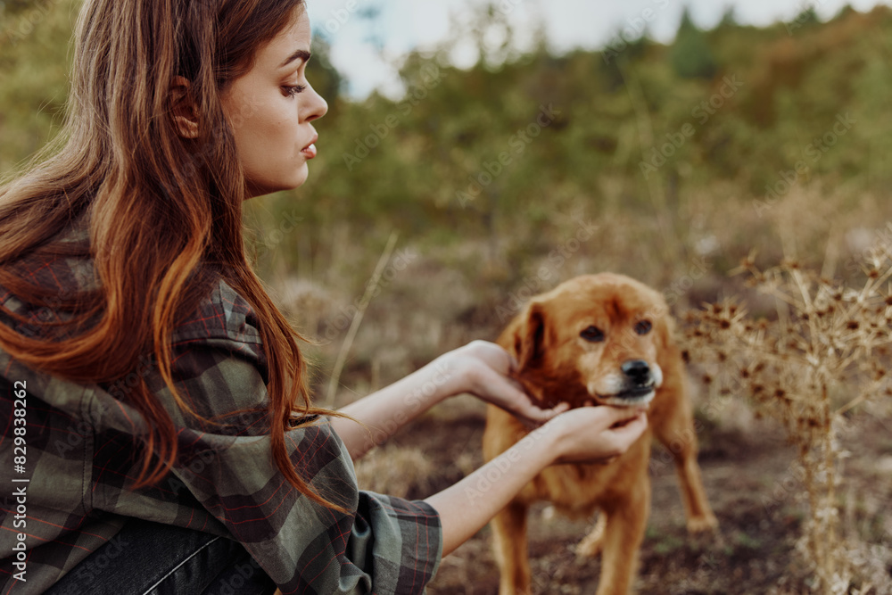 Woman bonding with a dog in a serene countryside setting with lush forest background, connection, nature, relaxation, pet therapy Woman bonding with a dog in a serene countryside setting with lush forest background, connection, nature, relaxation, pet therapy