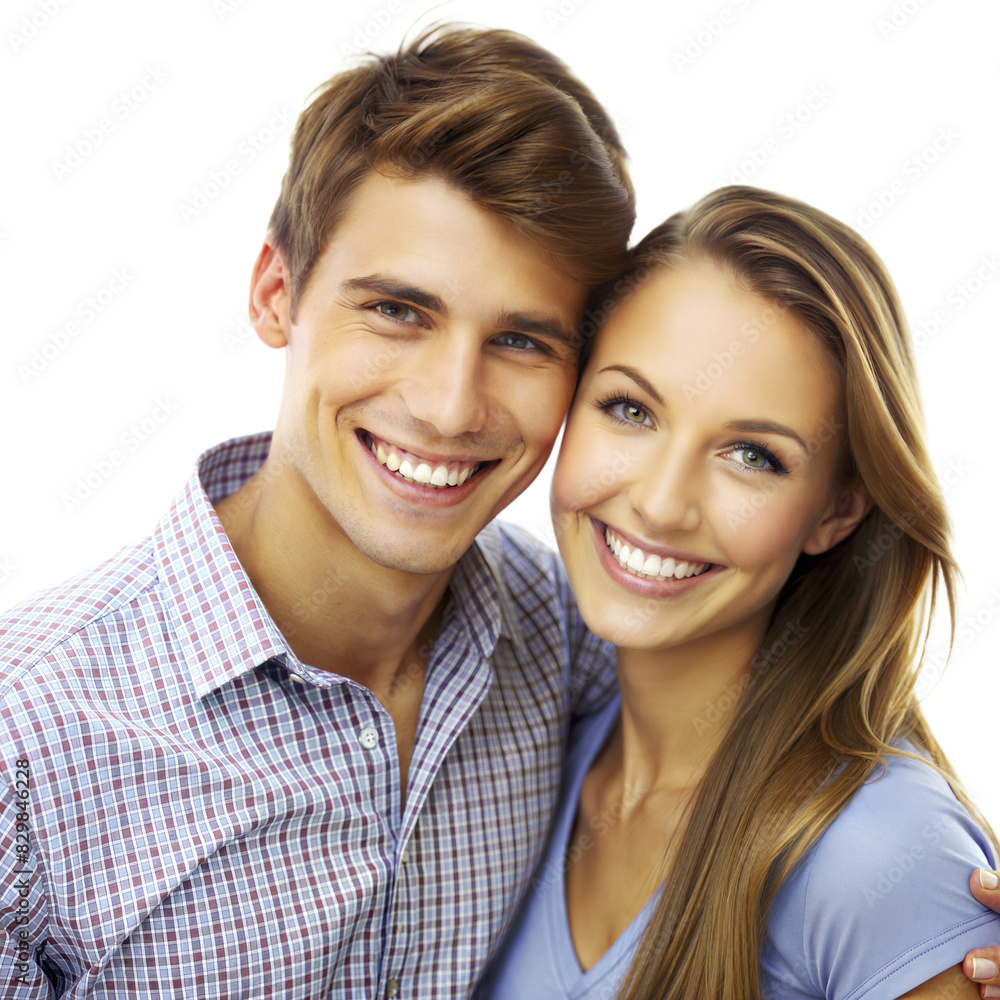 A young couple smiling and embracing, standing close together A young couple smiling and embracing, standing close together