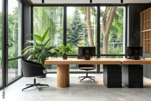 Modern open space office interior with desks and work places, large windows, green plants, wood flooring, vintage industrial style architecture. Modern open area working environment  photo