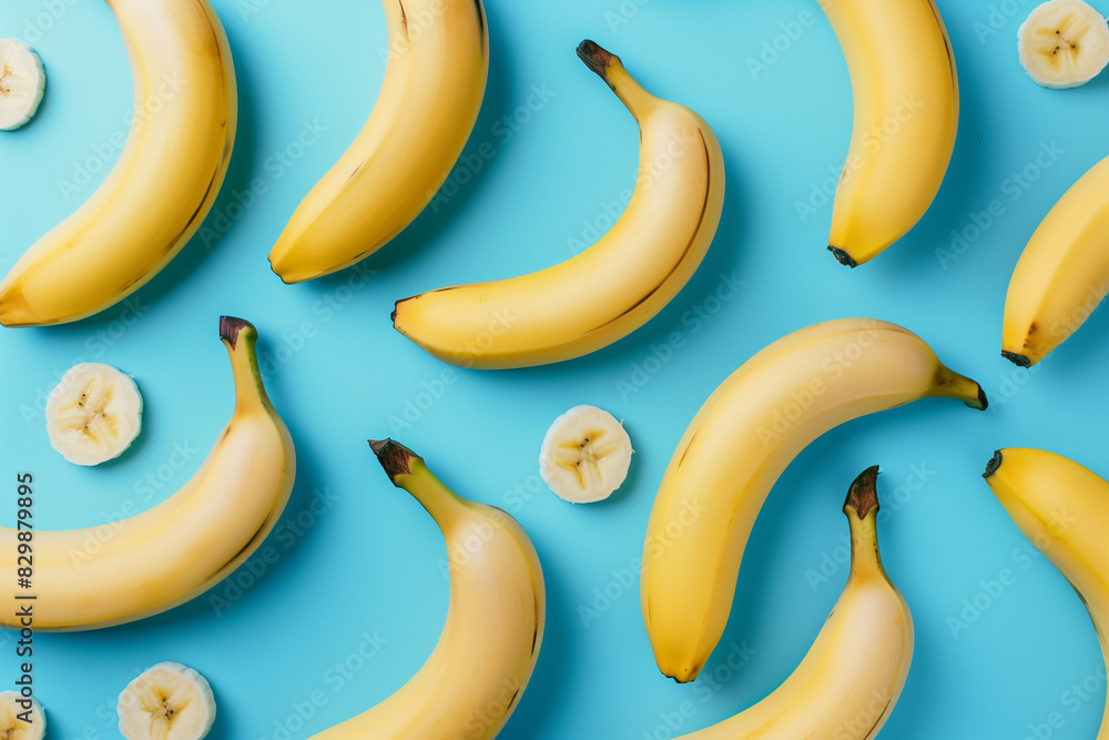 there are bananas and bananas are arranged on a blue surface