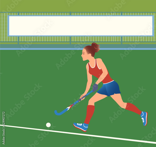 Woman Playing Feld Hockey, hit a ball with a field hockey stick. Green field with lines and Advertising banner  on the fence.