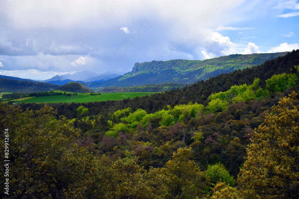 Valdegovía landscape with cloudy sky and spring forests Valdegovía landscape with cloudy sky and spring forests