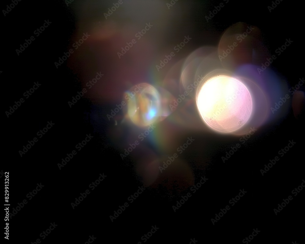 A few light leaks of lens flare on black background A few light leaks of lens flare on black background