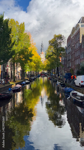 Amsterdam autumn cityscape narrow old houses, canals, boats Amsterdam, Netherlands September 20, 2023