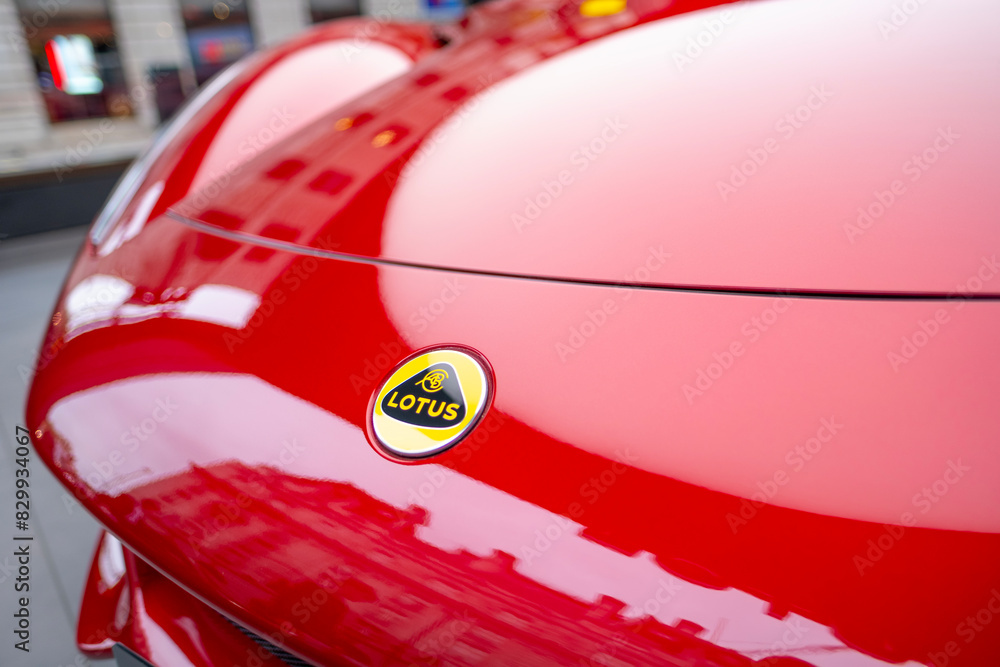 red Lotus Emira in showroom, British exciting sports car Lotus Cars ...