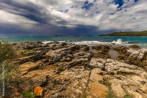 Landscape of the Croatian coast around Rovinj, rocky beaches, azure Adriatic Sea