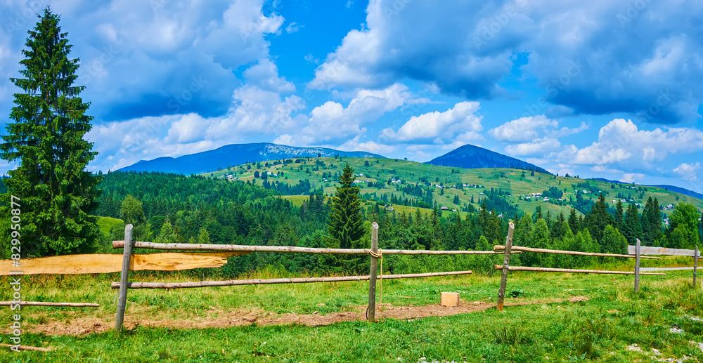 Green mountains behind the fence, Yablunytsya, Carpathians, Ukraine Green mountains behind the fence, Yablunytsya, Carpathians, Ukraine