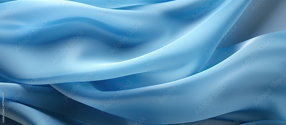 Obraz premium The background of the fabric displays a soft blurry light blue pattern providing ample copy space for images