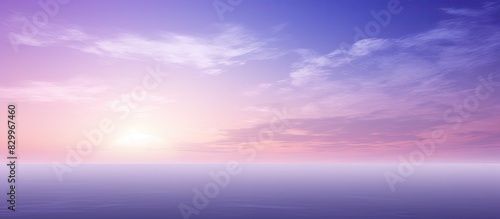 A captivating image of a purple sky at twilight bathed in sunlight with ample room for text or design elements © vxnaghiyev