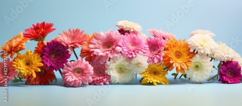 Colorful bouquet of Gerbera daisies and Carnation flowers arranged flawlessly Perfect for adding a vibrant touch to any event or occasion The copy space image will be truly captivating