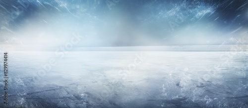 A copy space image of a frozen backdrop exhibiting visible traces of ice related activities like skating and hockey