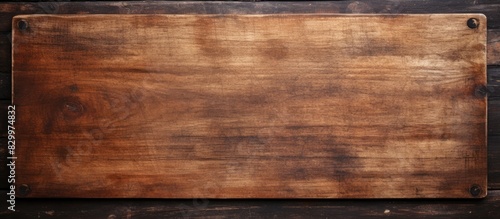 Close up of a vintage cutting board on an old wooden background with space available for text in the image. with copy space image. Place for adding text or design