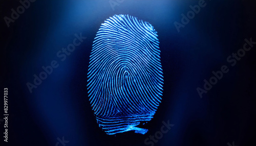 Close-up fingerprint illuminated in a cool blue hue in a dark background, intricate ridges and whorls for biometric and forensic technology, security.