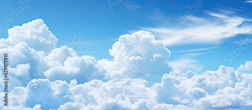 Cloud filled sky with vibrant colors offering ample copy space for creative purposes