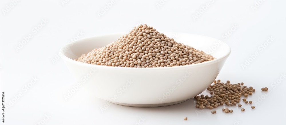 A healthy organic cereal raw buckwheat is served in a bowl with a white background It can also be served in a plate as porridge Plenty of copy space is available for text A healthy organic cereal raw buckwheat is served in a bowl with a white background It can also be served in a plate as porridge Plenty of copy space is available for text
