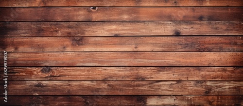 A close up copy space image of an old wooden board wall showcasing its textured surface in a vintage background