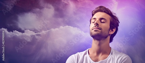 Caucasian man dreams of achieving goals and purposes on a purple background in a copy space image photo