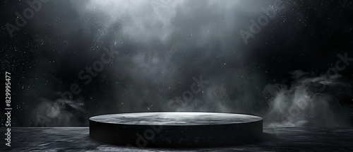 Black round stage with white spotlight in dark foggy background. photo
