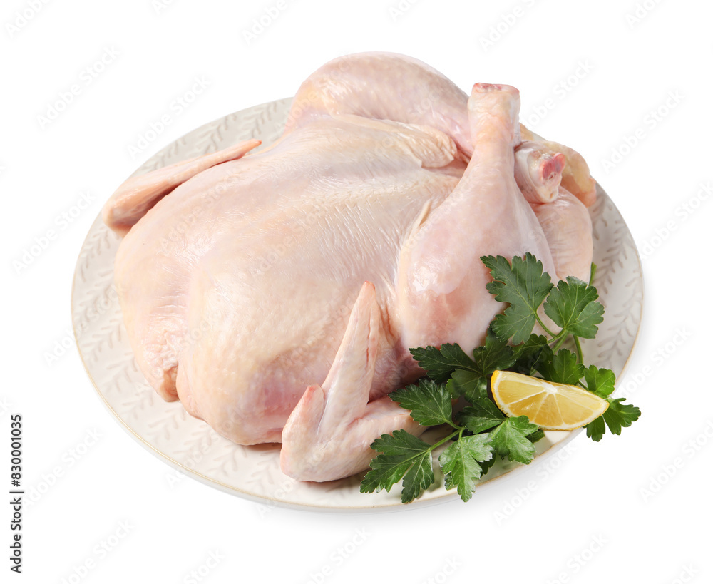 Fresh raw chicken with lemon and parsley isolated on white Fresh raw chicken with lemon and parsley isolated on white