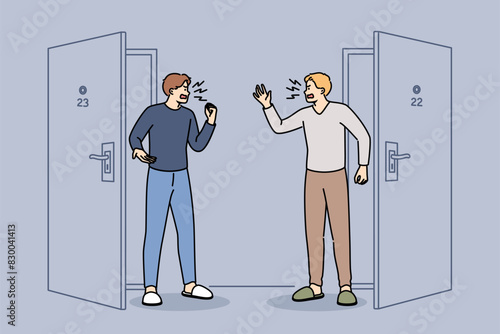 Conflict and cursing of neighbors standing in corridor near door, shouting insults or mutual grievances. Man neighbors stand in hallway of residential building and quarrel over noisy behavior