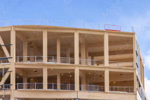 The solid wood floors, vertical supports and interior ceilings of a mass (solid) timber multi story construction project