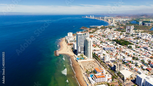 Konstfotografi An aerial view of Mazatlán Beach on a sunny morning, showcasing the blue ocean's