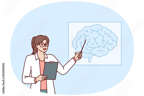 Woman doctor teaches neurology pointing at brain drawing hanging on wall during medical education course. Doctor neurologist shows picture of brain to ask colleagues for advice