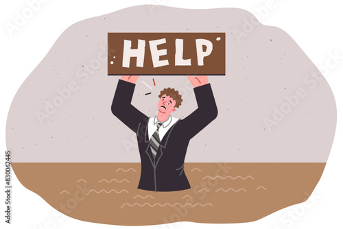 Man asks for help stuck in quicksand, as metaphor for economic crisis and problems in labor market