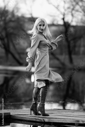 Portrait of a young beautiful blonde girl. Black and white photo.