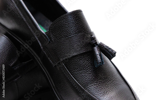 Close-up of fashionable men's leather shoes on white background.