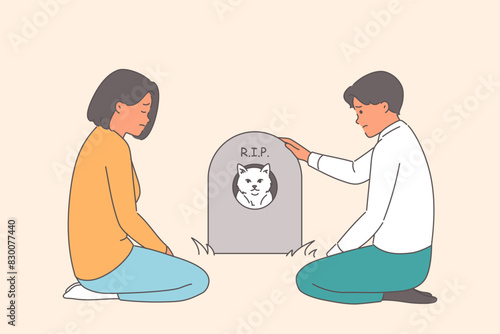 Sad people bury beloved cat sitting near gravestone with inscription rip and portrait of cute pet