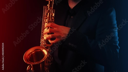 Man Plays The Saxophone At Concert
 photo