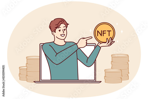 Man with gold coin with inscription nft leans out of laptop screen while trading digital art at auction. Concept selling virtual content on Internet and online distribution of NFT tokens