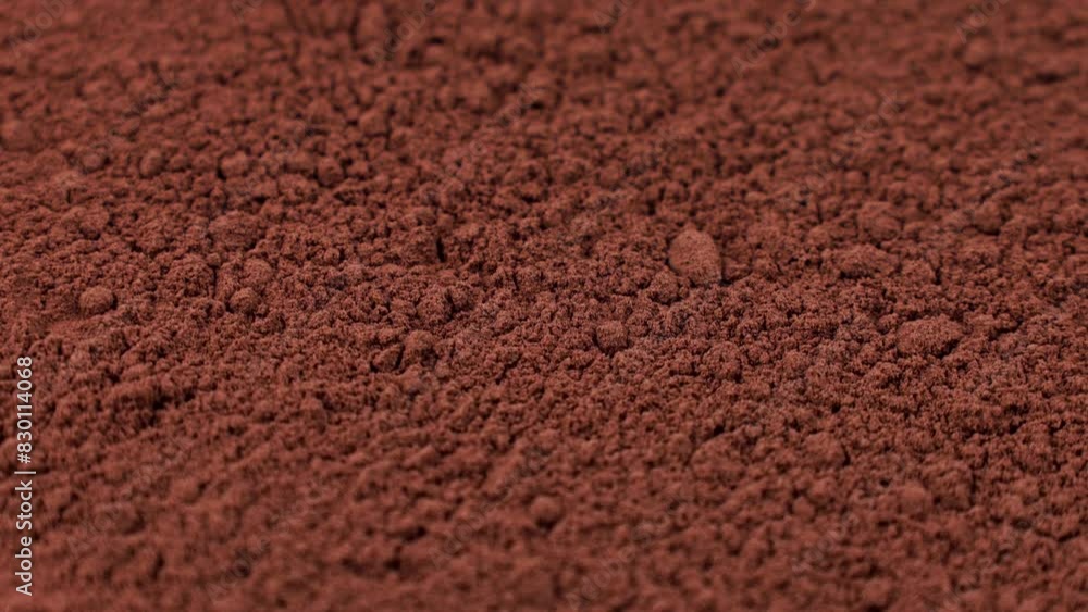 Brown cocoa powder texture circle rotation close up Brown cocoa powder texture circle rotation close up