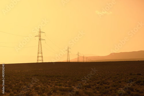 Obraz na płótnie Electric power poles in southern Morocco desert w salonie