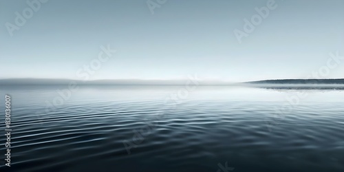 A serene lake under a clear sky symbolizes a peaceful and untroubled mind. Concept Nature, Serenity, Mindfulness, Peace, Tranquility