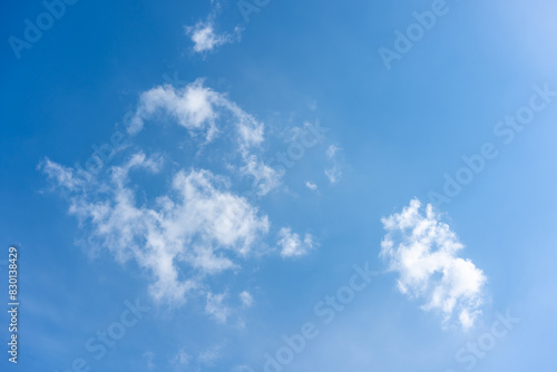 White fluffy clouds in front of a blue sky © DZiegler