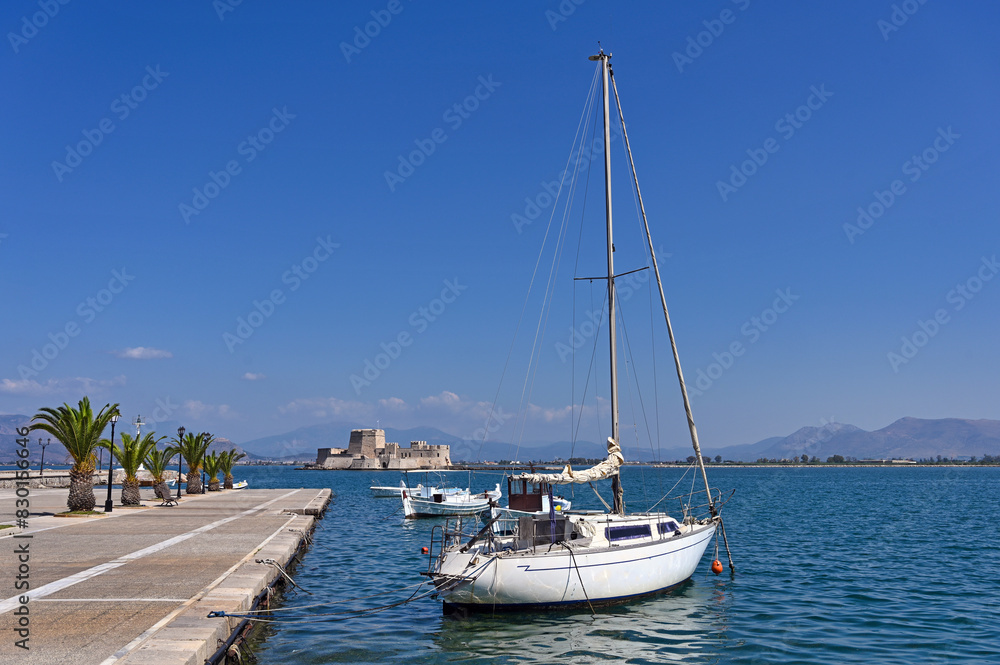 Bourtzi fortress and port with boats in Nafplio, Peloponnese, Greece