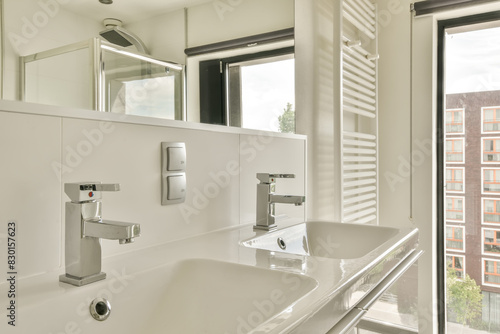 Modern bathroom interior with city view photo