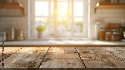 Wooden table top with copy space for product advertising over blurred white kitchen background at home with window and golden sunlight