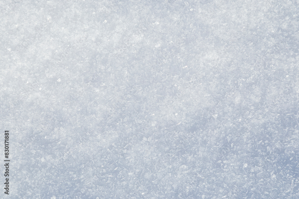 Close-up of fresh and bright snowy land in the winter, viewed from above. Abstract full frame textured background with copy space. Top view. Close-up of fresh and bright snowy land in the winter, viewed from above. Abstract full frame textured background with copy space. Top view.