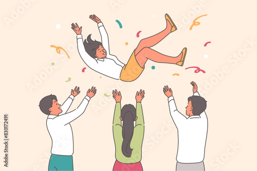 People throw birthday girl during party with confetti, congratulating female friend on holiday